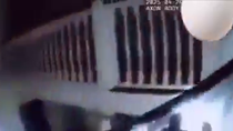 Thumbnail for Female cop shoots own reflection in mirror 