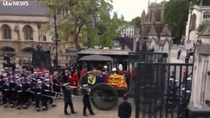 Thumbnail for Queen's coffin taken in procession to Westminster Hall.