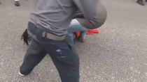 Thumbnail for BLM protestor picks up large piece of concrete, is immediately dropped by rubber bullet to the head