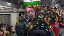 Thumbnail for Reverse UNO, Mumbai Edition - Scottish guy playing bagpipes on a train in India to culturally enrich them.