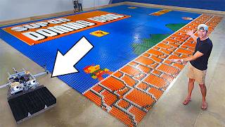 Thumbnail for World Record Domino Robot (100k dominoes in 24hrs) | Mark Rober