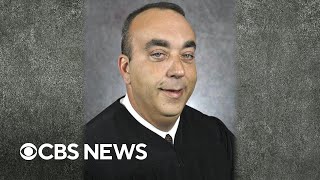Thumbnail for Sheriff charged in killing of Kentucky judge inside courthouse, police say | CBS News