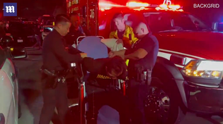 Thumbnail for Bloodied and battered Chappelle attacker loaded into ambulance